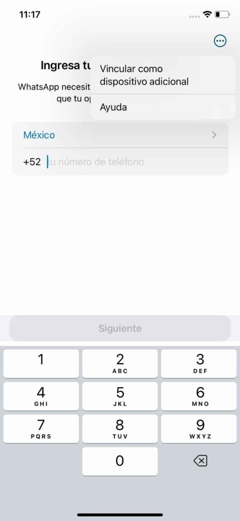 Pantalla inicial de WhatsApp Business con opciones "Vincular como dispositivo adicional" y "Ayuda". Muestra selector de país (México +52) y campo de entrada
de número de teléfono con teclado numérico visible y botón "Siguiente"
deshabilitado. Este es el primer paso para vincular un nuevo dispositivo a
la cuenta de WhatsApp Business.